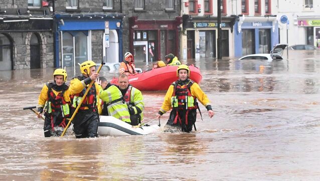 <p>Midleton residents have expressed concern at the slow progress in the town’s much-needed flood scheme, as new data has shown a reduction in the money being spent on the plan. Pictured is the flooding on Main St in October 2023. Picture: Eddie O'Hare</p>