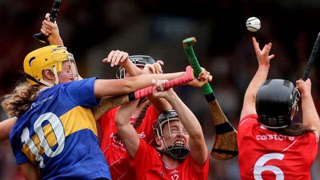 <p>RESOLUTE: Tipperary's Eimear Heffernan comes up against Meabh Murphy and Millie Condon of Cork. Picture: INPHO/Bryan Keane</p>