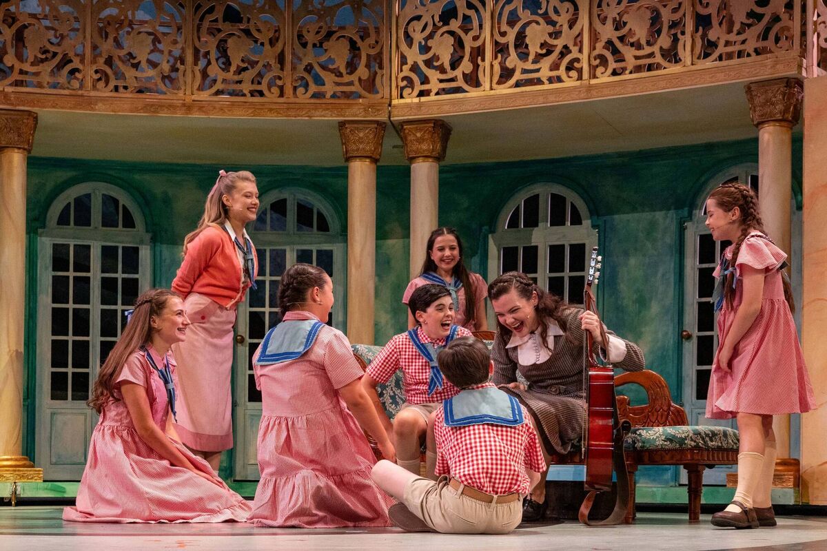 Wendy Carr as Maria with the von Trapp children.  Picture: Shane J Horan.