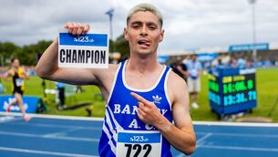 <p>Darragh McElhinney celebrates winning the Men’s 5000m Final</p>