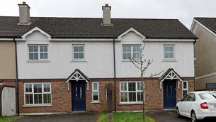 <p>Two of the three vacant houses in Copper Valley Heights, Riverstown, Glanmire.</p>