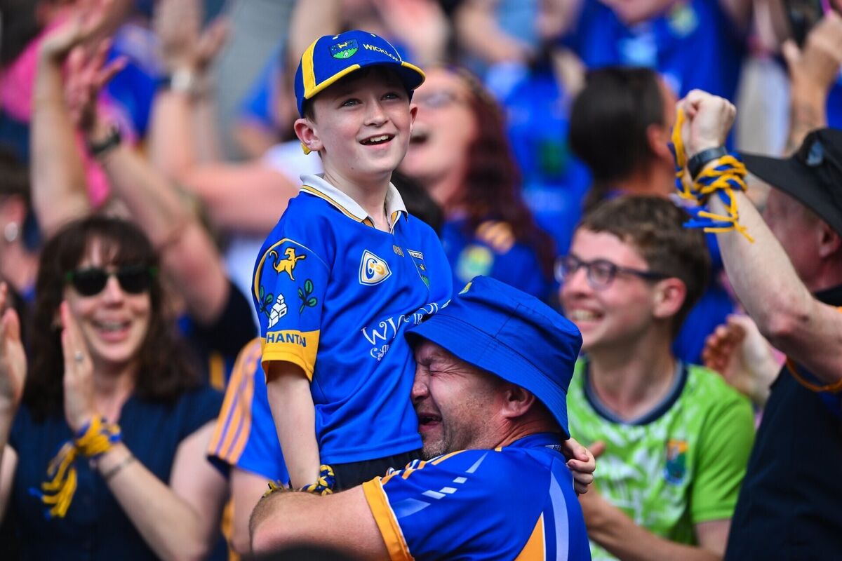 Wicklow supporter Mick Kelly, from Kiltegan, embraces his son Michael Anthony, age 10, at the final whistle after victory. Picture: Piaras Ó Mídheach/Sportsfile Wicklow supporter Mick Kelly, from Kiltegan, embraces his son Michael Anthony, age 10, at the final whistle after victory. Picture: Piaras Ó Mídheach/Sportsfile