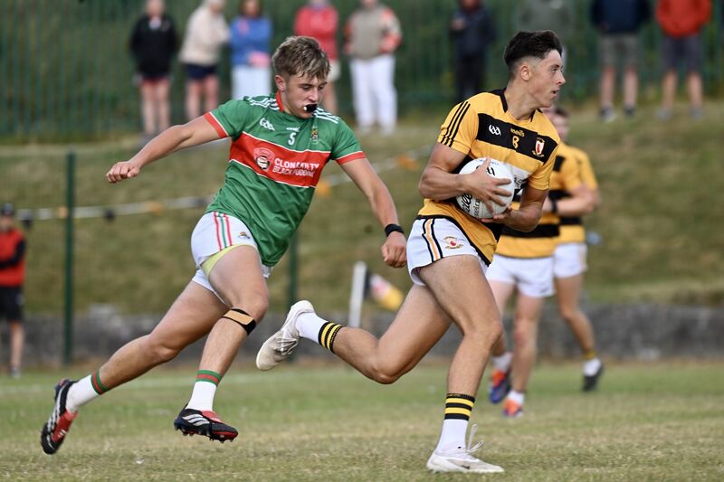 Corey O’Sullivan races through midfield for Na Piarsaigh, chased by Ewan Knowles, Clonakilty. Picture: Larry Cummins Corey O’Sullivan races through midfield for Na Piarsaigh, chased by Ewan Knowles, Clonakilty. Picture: Larry Cummins