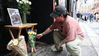 Tearful fans queue in Dublin to express condolences over Glen Hansard’s death
