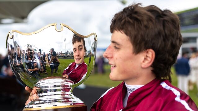 <p>Daniel King celebrates winning The Guinness Galway Hurdle Handicap (Grade 3) with Putapoundinthejar</p>
