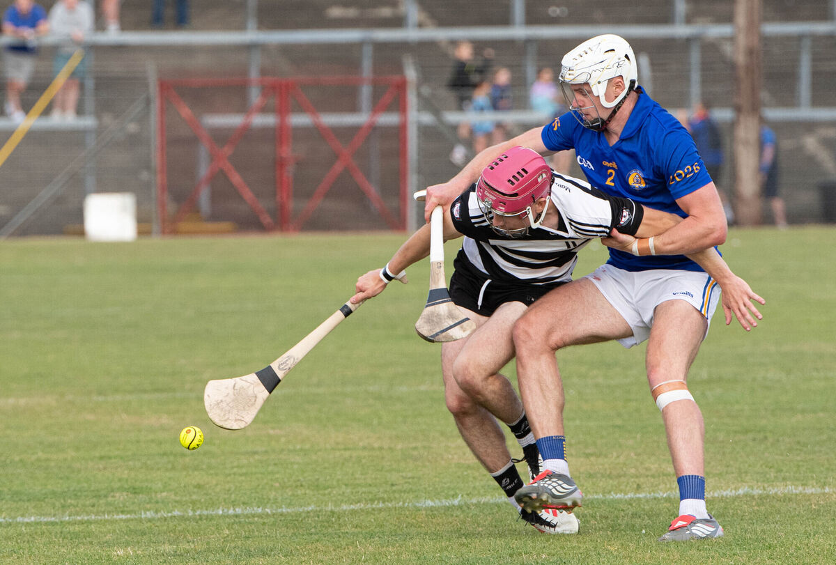 Midleton's Alex Quirke tussles with Ciarán Doolan of St Finbarr's. Picture: Howard Crowdy