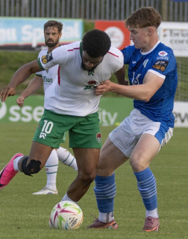 Josh Cullen gets to grips with former Harps player Cork City's Kamta Mpongo. (North West Newspix) Josh Cullen gets to grips with former Harps player Cork City's Kamta Mpongo. (North West Newspix)