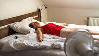 Should I sleep with a fan on? Here are the pros and cons
