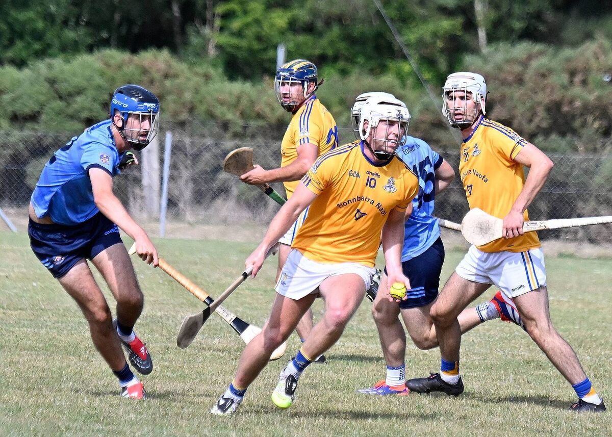 St Finbarr's Caolan O'Connor passes the sliotar as Barryroe's Jack Murphy closes in the Co-Op Superstores Premier Junior Hurling Championship game in Belgooly. Picture: Martin Walsh. St Finbarr's Caolan O'Connor passes the sliotar as Barryroe's Jack Murphy closes in the Co-Op Superstores Premier Junior Hurling Championship game in Belgooly. Picture: Martin Walsh.