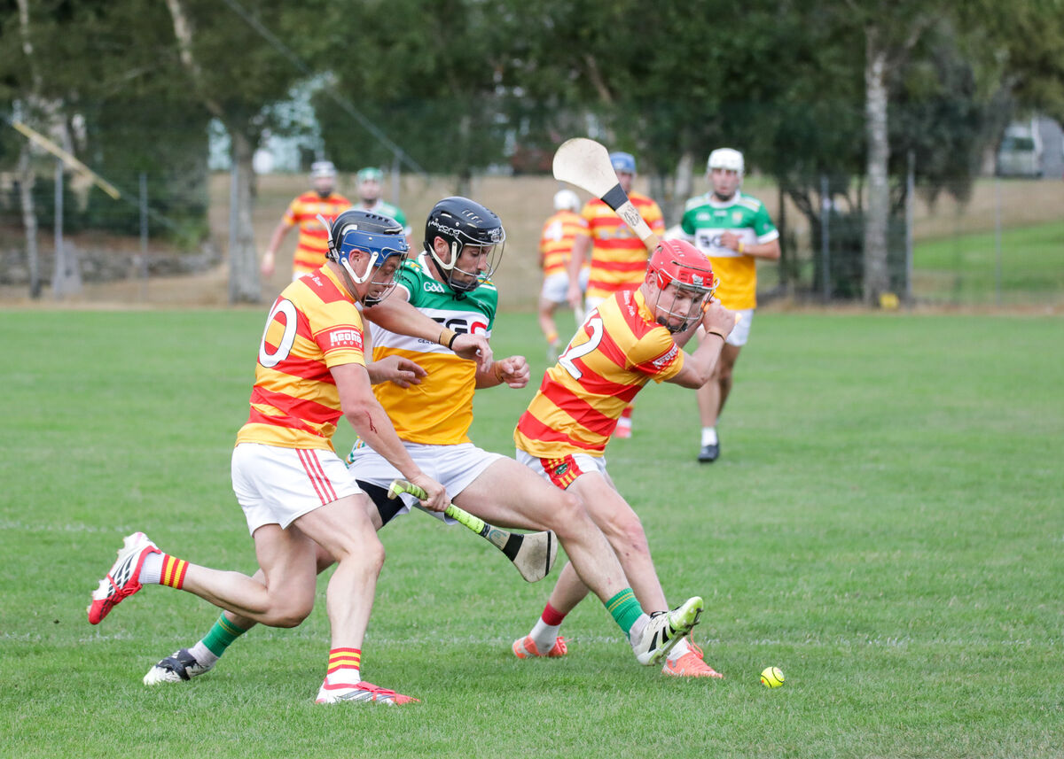 Newcestown's Richard O'Sullivan tries to clear before a tackle from Bride Rovers' Conleith Ryan during the Co-Op Superstores Senior Hurling Championship game at Ballincollig. Picture: David Creedon Newcestown's Richard O'Sullivan tries to clear before a tackle from Bride Rovers' Conleith Ryan during the Co-Op Superstores Senior Hurling Championship game at Ballincollig. Picture: David Creedon