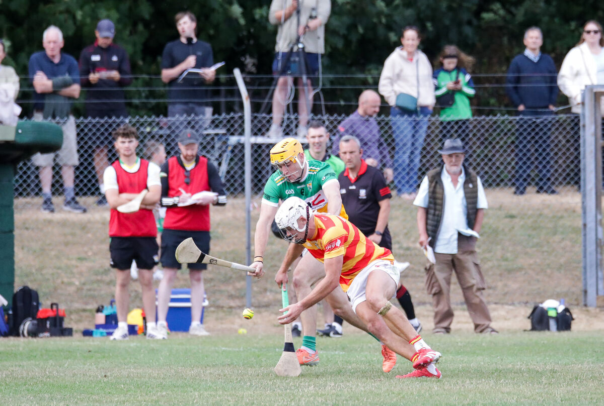 Newcestown's Gearóid O'Donovan and Bride Rovers Cillian Tobin battle for the sliotar at Ballincollig. Picture: David Creedon