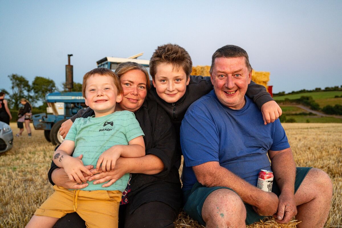 The Cotter family, Joe, Ania, Tom and PJ Cotter, pictured after lending a hand during the community haymaking evening at Dennis Hickey’s farm near Midleton, Co Cork. Picture: Chani Anderson The Cotter family, Joe, Ania, Tom and PJ Cotter, pictured after lending a hand during the community haymaking evening at Dennis Hickey’s farm near Midleton, Co Cork. Picture: Chani Anderson