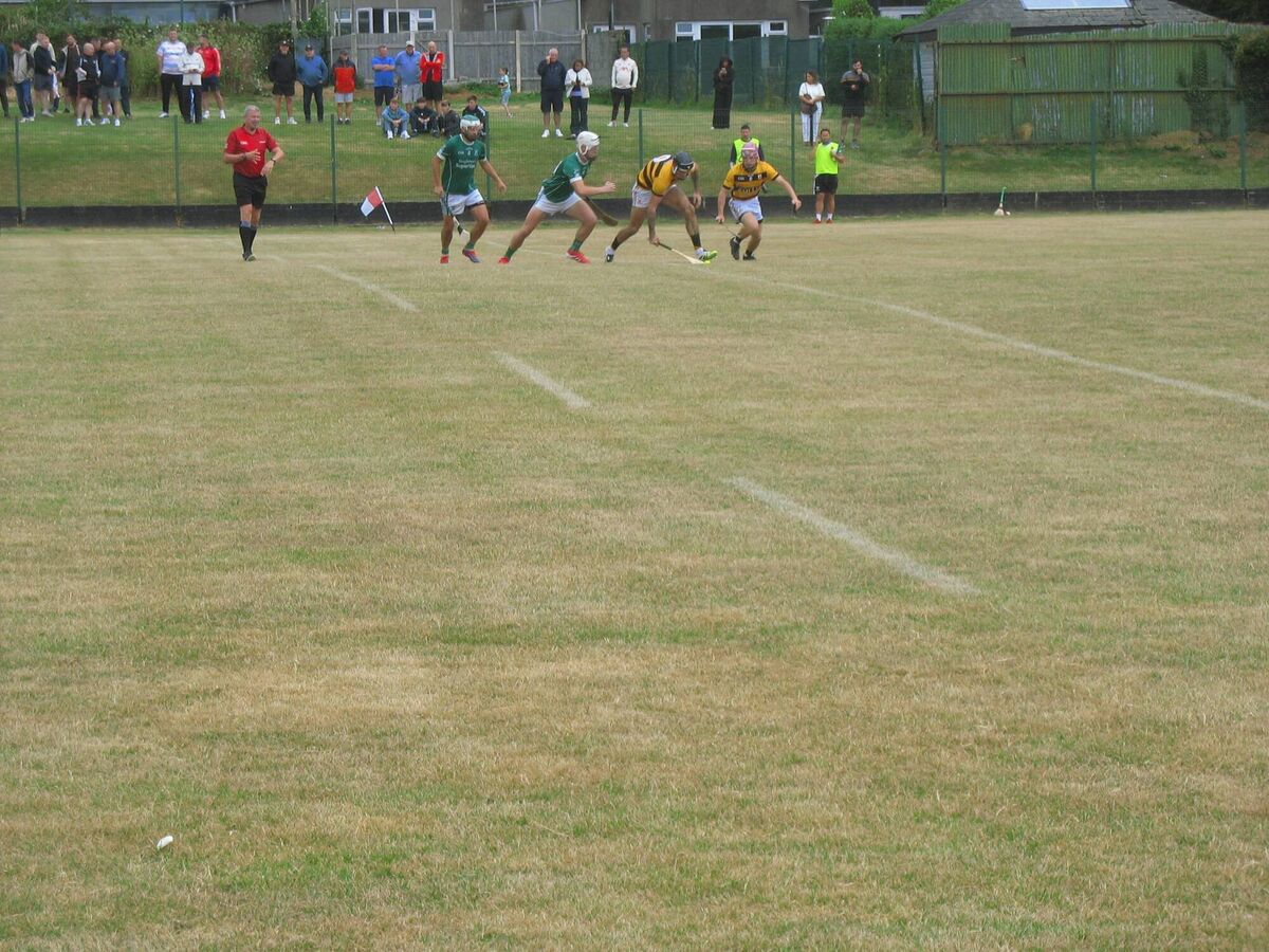 Jamie Morrissey (No 9 Na Piarsaigh) breaking away from the throw-in at the start of the second half Jamie Morrissey (No 9 Na Piarsaigh) breaking away from the throw-in at the start of the second half