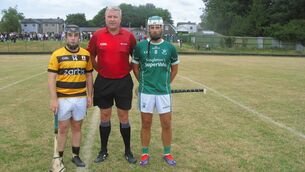 <p>Referee Cormac Dineen accompanied by captains Michael Sheehan (Na Piarsiagh) & Anthony Harte (St. Vincent's) </p> <p>Referee Cormac Dineen accompanied by captains Michael Sheehan (Na Piarsiagh) & Anthony Harte (St. Vincent's) </p>