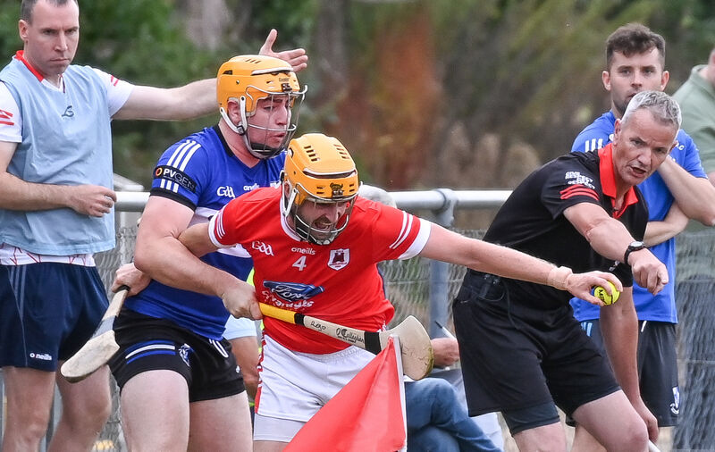 Charleville's Finbarr Cagney is tackled by Sarsfields' Shane O'Regan during their Premier SHC clash at Castletownroche. Picture: David Keane. Charleville's Finbarr Cagney is tackled by Sarsfields' Shane O'Regan during their Premier SHC clash at Castletownroche. Picture: David Keane.