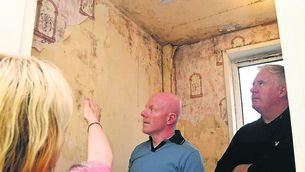 <p class="contextmenu internal_Caption">A tenant pointing out the mould and water damage from leaks in the bathroom in a flat at Noonan’s Road, Cork, to councillor Mick Finn (right) and William O’Brien, community activist. <span class="contextmenu emphasis CaptionCredit">Picture: Denis Minihane</span>
</p> <p class="contextmenu internal_Caption">A tenant pointing out the mould and water damage from leaks in the bathroom in a flat at Noonan’s Road, Cork, to councillor Mick Finn (right) and William O’Brien, community activist. <span class="contextmenu emphasis CaptionCredit">Picture: Denis Minihane</span>
</p>