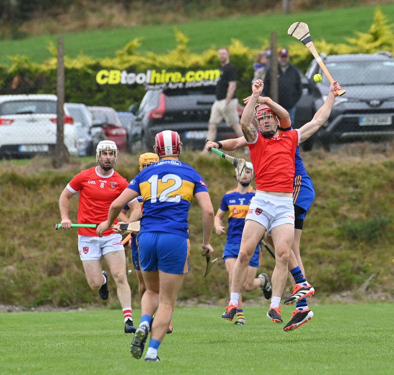 Barry Lawton, Castlemartyr wins this high ball watched by Finn O'Connell, Carrigaline. Picture: Dan Linehan Barry Lawton, Castlemartyr wins this high ball watched by Finn O'Connell, Carrigaline. Picture: Dan Linehan