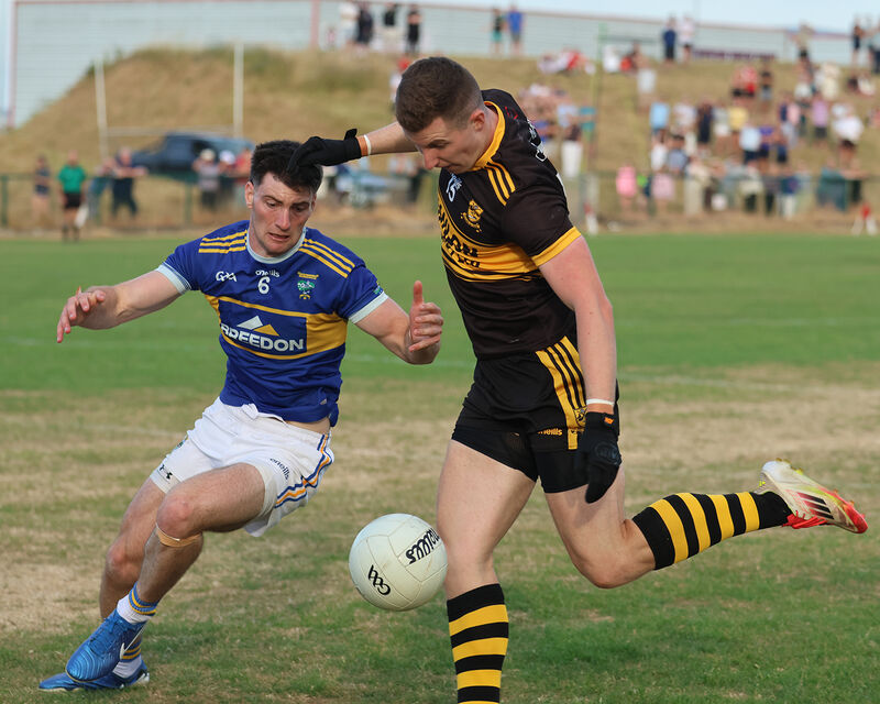 Conor Corbett of Clyda Rovers in possession of the ball against Colm O'Shea of Kilshannig. Picture: Brendan Gleeson Conor Corbett of Clyda Rovers in possession of the ball against Colm O'Shea of Kilshannig. Picture: Brendan Gleeson