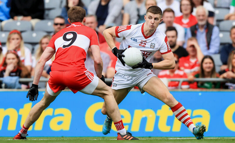 Cork's Conor Corbett tries to take on Brendan Rogers of Derry. Picture: Evan Treacy/INPHO Cork's Conor Corbett tries to take on Brendan Rogers of Derry. Picture: Evan Treacy/INPHO