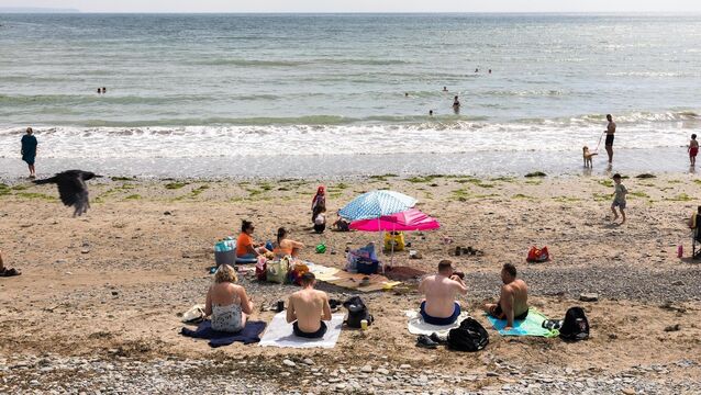 <p>Visitors enjoying the seaside on one of the hottest days of the summer in Fountainstown, Co. Cork. - Picture: David Creedon</p>