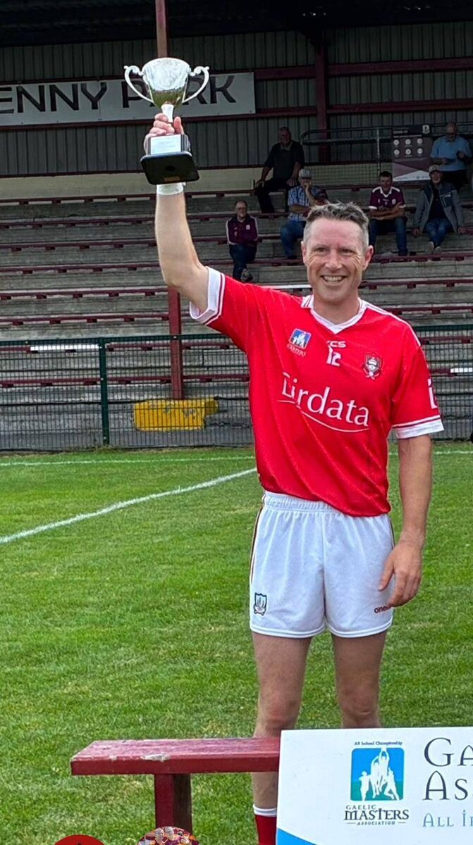 Cork Masters captain Brian Tobin lifts the trophy following victory over Limerick. Cork Masters captain Brian Tobin lifts the trophy following victory over Limerick.