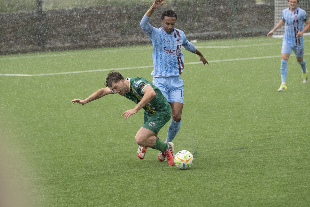 Cian Bargary, Kerry FC and Prince Jordan Adeyemi Cobh Ramblers ( Blue ) in action during the game Cian Bargary, Kerry FC and Prince Jordan Adeyemi Cobh Ramblers ( Blue ) in action during the game