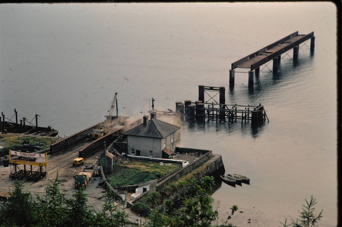 Bridge spans being brought to shore during the demolition of the old bridge at Youghal Bridge spans being brought to shore during the demolition of the old bridge at Youghal