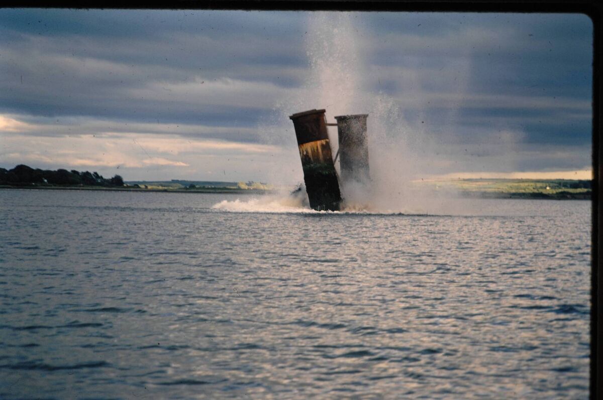 Piers being imploded during the demolition of the old bridge at Youghal Piers being imploded during the demolition of the old bridge at Youghal