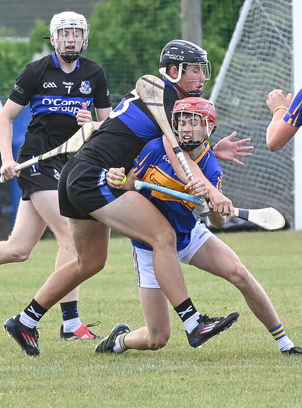 Carrigtwohill's Darragh Horgan is tackled by Sarsfields' Tom O'Flynn during their Premier 1 MHC clash at Carrigtwohill. Picture: David Keane Carrigtwohill's Darragh Horgan is tackled by Sarsfields' Tom O'Flynn during their Premier 1 MHC clash at Carrigtwohill. Picture: David Keane