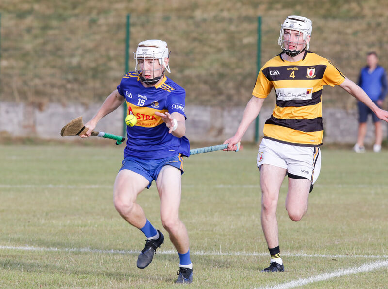 Carrigaline's Cillian Murphy tries to get away from Na Piarsaigh's Dara O'Leary. Picture: David Creedon Carrigaline's Cillian Murphy tries to get away from Na Piarsaigh's Dara O'Leary. Picture: David Creedon