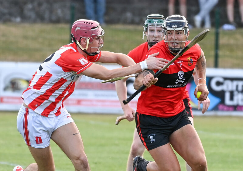 Imokilly's Conor Cahill tackles UCC's James Dwyer during their Divisions/Colleges Premier SHC clash at Midleton. Picture: David Keane. Imokilly's Conor Cahill tackles UCC's James Dwyer during their Divisions/Colleges Premier SHC clash at Midleton. Picture: David Keane.