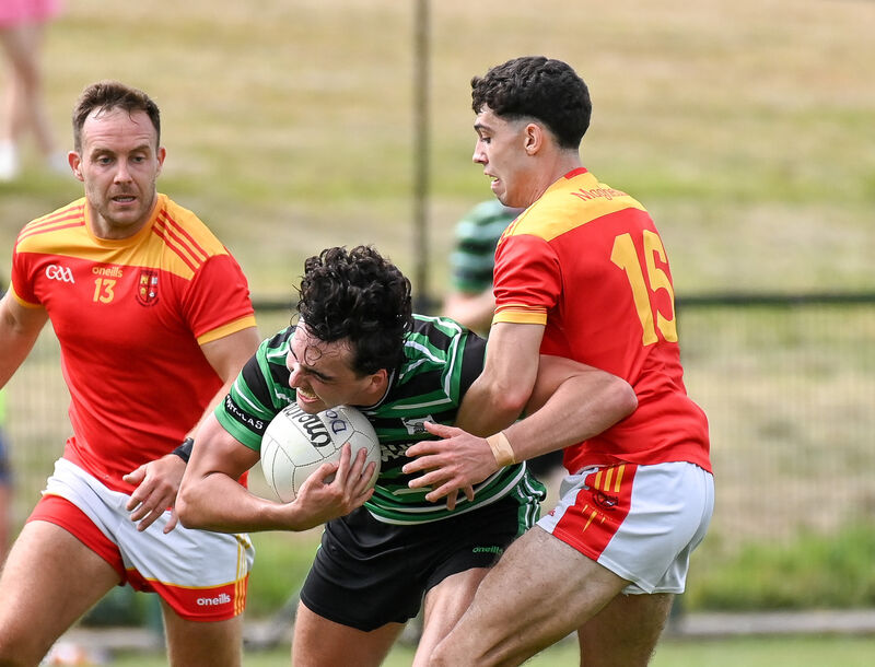 Douglas' David Buckley is tackled by Mallow's Cathal Mullins during their Premier SFC clash at Grenagh. Picture: David Keane Douglas' David Buckley is tackled by Mallow's Cathal Mullins during their Premier SFC clash at Grenagh. Picture: David Keane