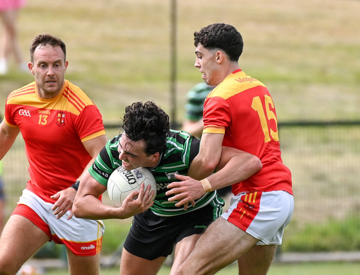 Douglas' David Buckley is tackled by Mallow's Cathal Mullins during their Premier SFC clash at Grenagh. Picture: David Keane Douglas' David Buckley is tackled by Mallow's Cathal Mullins during their Premier SFC clash at Grenagh. Picture: David Keane