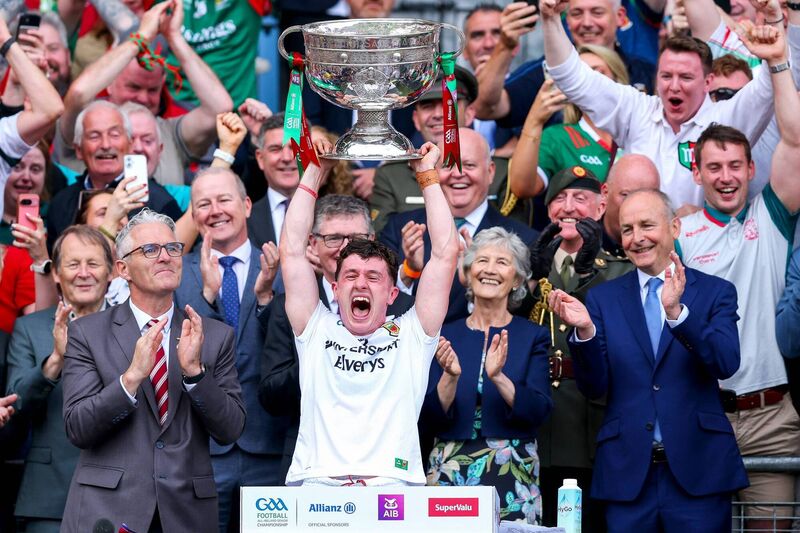 Mayo captain and Ballyhaunis native, Jack Coyne, lifts the Sam Maguire Cup in Croke Park on Sunday. Picture: INPHO/Tom O’Hanlon