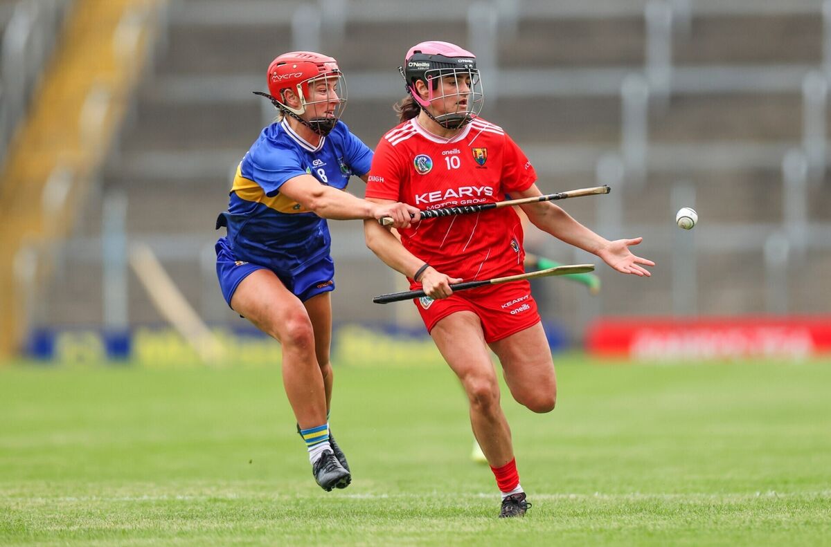 Tipperary's Karen Kennedy challenges Emma Murphy of Cork. Picure: INPHO/Tom Maher