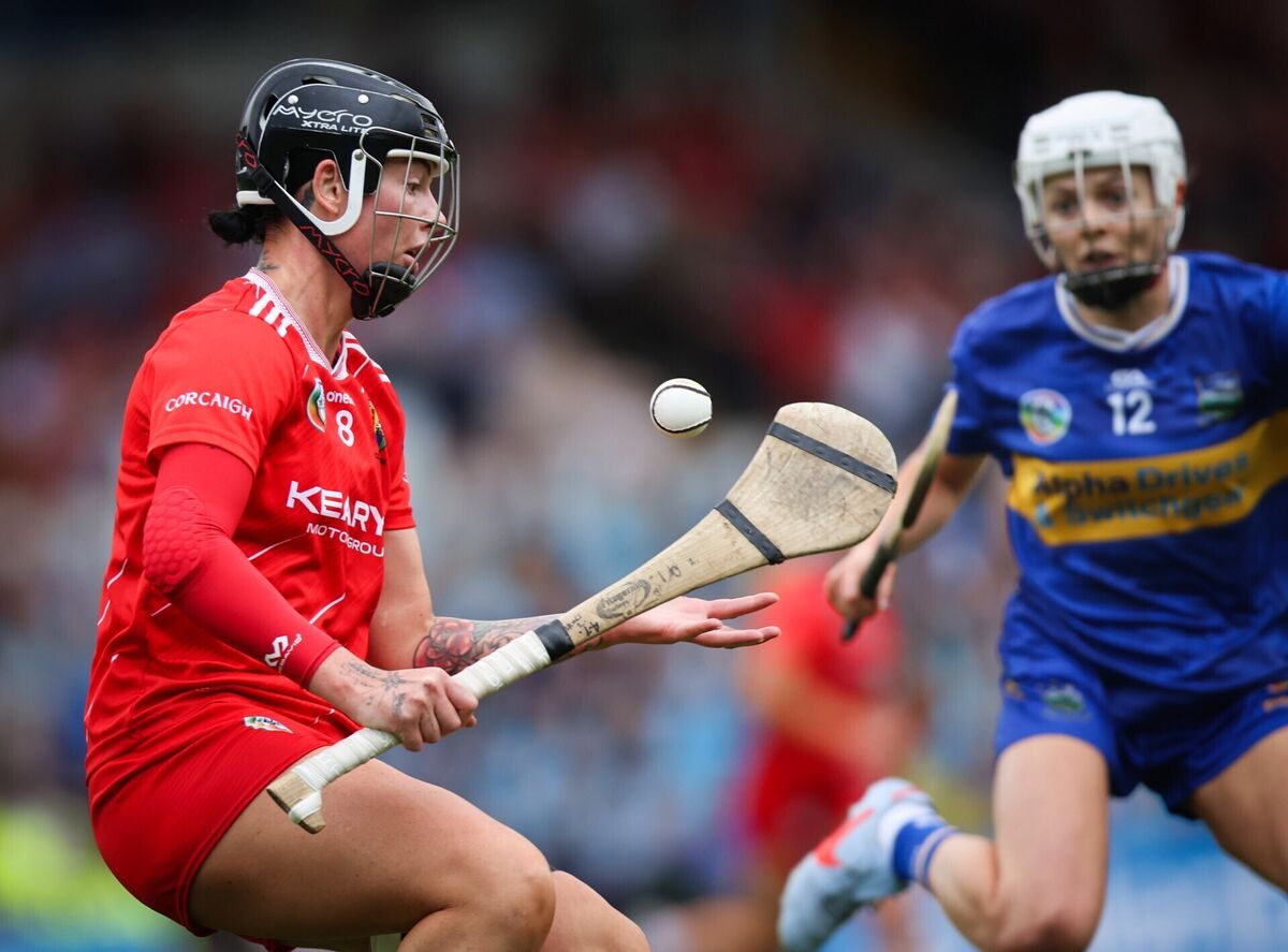 Cork's Ashling Thompson is challenged by Clodagh McIntyre of Tipperary during their Glen Dimplex All-Ireland senior camogie championship semi-final clash at FBD Semple Stadium. Picture: INPHO/Tom Maher