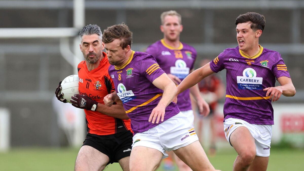 Seamus Hickey of Duhallow battles with Aaron Hayes and Killian O'Brien of Carbery. Picture: Jim Coughlan Seamus Hickey of Duhallow battles with Aaron Hayes and Killian O'Brien of Carbery. Picture: Jim Coughlan