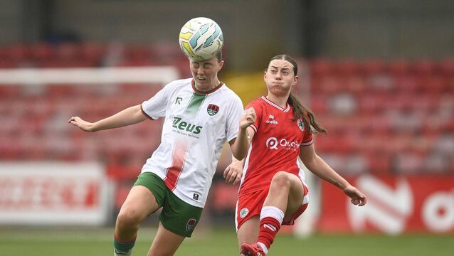 <p>Cork city’s Heidi Mackin and Cliftonville’s Naomi McLaughlin in All-Island Cup action at Solitude Stadium. Picture: Mark Marlow</p>