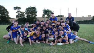 <p>The Carrigaline U21 footballers celebrate beating Valley Rovers to land the Carrigdhoun title. Picture: JJ Hurley.</p>