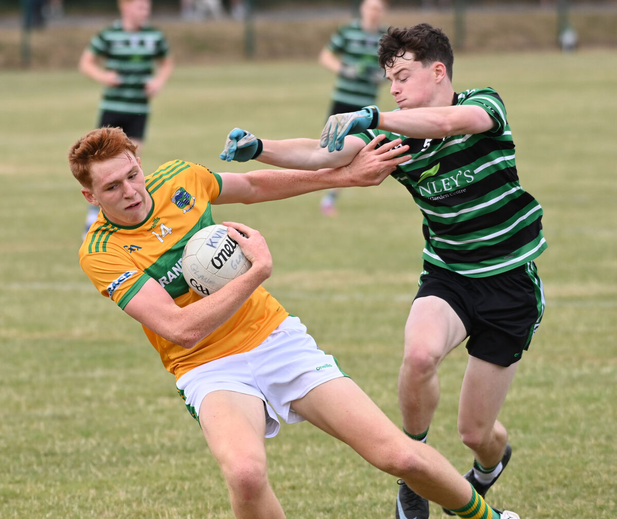 Conor McLoughlin of Douglas looks to halt the progress of Glanmire's Eoin Considine. Picture: Eddie O'Hare Conor McLoughlin of Douglas looks to halt the progress of Glanmire's Eoin Considine. Picture: Eddie O'Hare