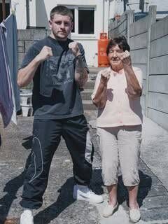 Cork professional boxer Callum Walsh with his grandmother Kay on his recent visit to his hometown in Cobh. Cork professional boxer Callum Walsh with his grandmother Kay on his recent visit to his hometown in Cobh.