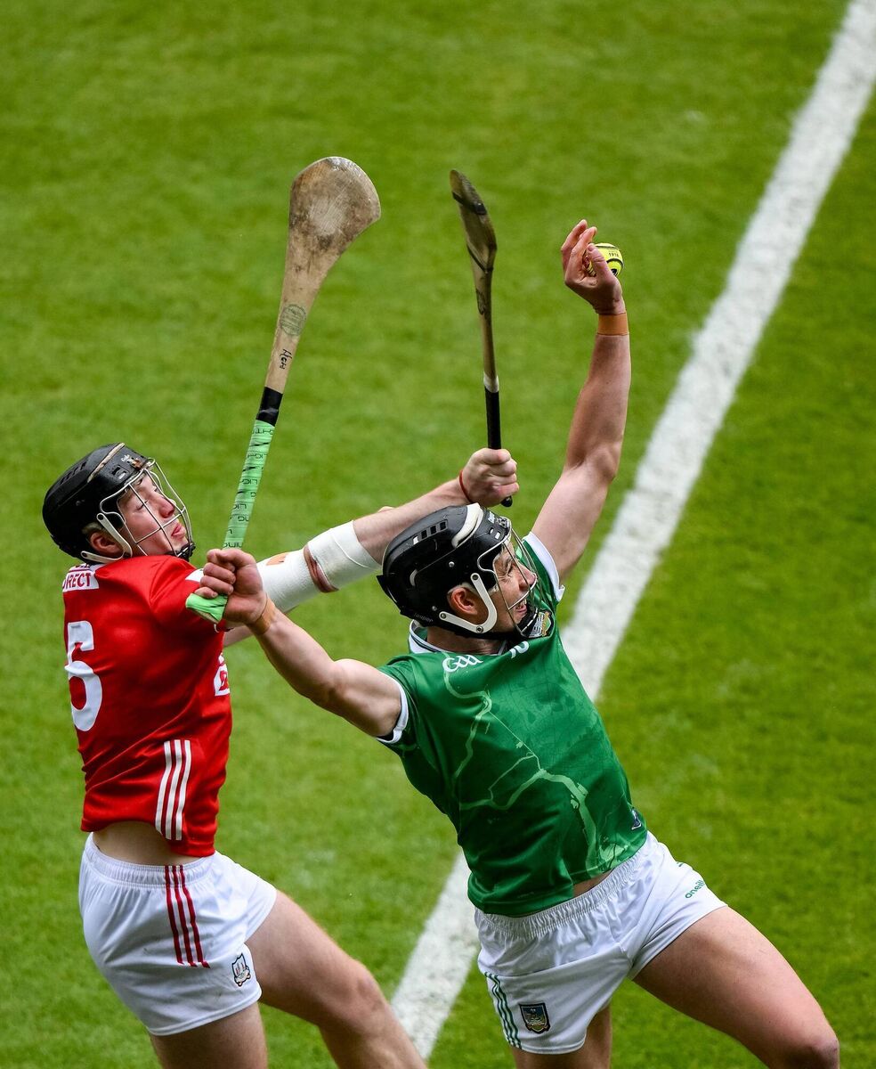 Gearóid Hegarty of Limerick grabs a puck-out ahead of Eoin Downey of Cork. Picture: Brendan Moran/Sportsfile Gearóid Hegarty of Limerick grabs a puck-out ahead of Eoin Downey of Cork. Picture: Brendan Moran/Sportsfile