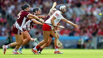 Méabh Cahalane is tackled by Dervla Higgins, Niamh Niland and Ailish O'Reilly 9/8/2026