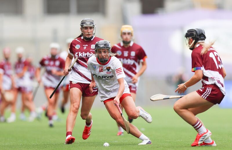 Cork's Millie Condon takes on Carrie Dolan and Niamh Niland of Galway. Picture: INPHO/Tom Maher