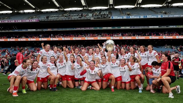 <p>REBEL YELL: The Cork team celebrate with the O'Duffy Cup after the match at Croke Park after beating Galway. Picture: INPHO/James Crombie</p>