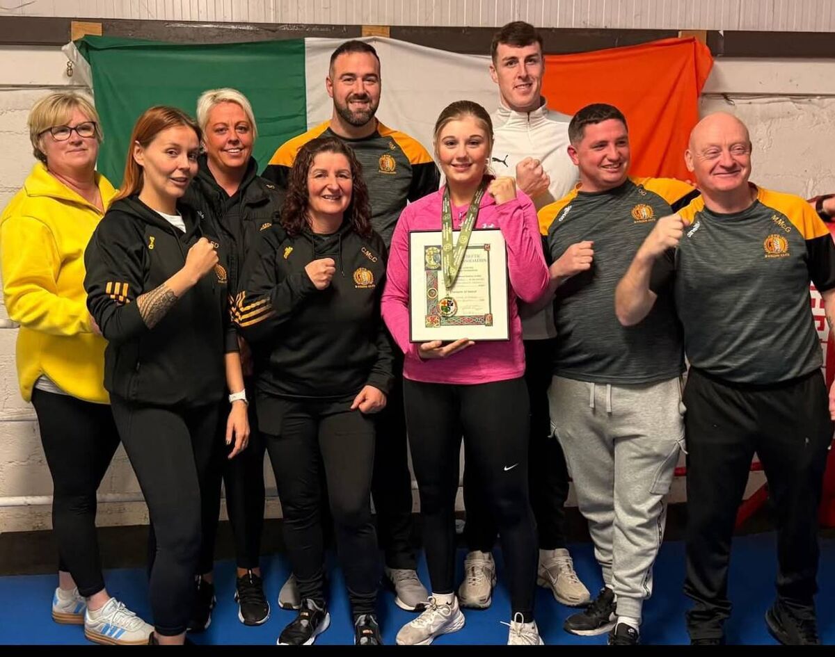 Cork Boxing: The Cove Boxing Club coaches and committee with All-Ireland champion Saoirse O'Riordan.