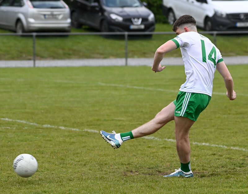 Muskerry's Ed Myers fires the ball to the Avondhu net. Picture: David Keane. Muskerry's Ed Myers fires the ball to the Avondhu net. Picture: David Keane.