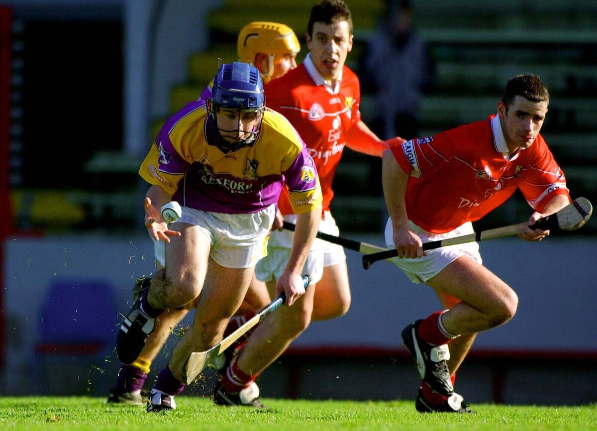 Wexford's Barry Lambert breaks free from Mark Prendergast of Cork to get the pass away at Páirc Uí Chaoimh. Wexford's Barry Lambert breaks free from Mark Prendergast of Cork to get the pass away at Páirc Uí Chaoimh.