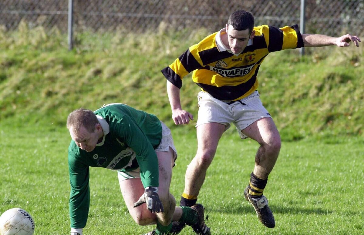 Mark Prendergast, Na Piarsaigh, and David Bourke, Ballincollig, challenge for the ball. Mark Prendergast, Na Piarsaigh, and David Bourke, Ballincollig, challenge for the ball.