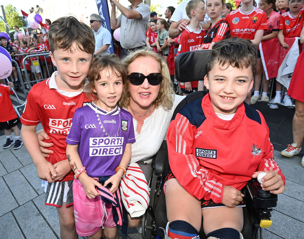 Therese Clarke with her children Ned, Hannah, and Adam, from Newcestown, at the Cork homecoming on the Grand Parade. Picture: Eddie O'Hare Therese Clarke with her children Ned, Hannah, and Adam, from Newcestown, at the Cork homecoming on the Grand Parade. Picture: Eddie O'Hare